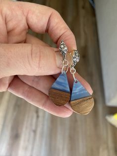 Wood and resin element in a lovely storm blue on a silver filigree earring hook. Reminds me of looking at the sky! Looking At The Sky, Wood And Resin, Look At The Sky, Earring Hook, Filigree Earrings, Silver Filigree, The Sky, Jewelry Earrings Dangle, Dangle Drop Earrings