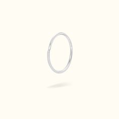 Jewelry Information: Material: 14k Gold Designed For: Nose & Helix Ring Thickness: 20g (0.8mm) Ring Diameter: 1/4 (6mm), 5/16 (8mm) , 3/8 (10mm) Classic Small Hoop Rings For Everyday, Hypoallergenic White Gold Hoop Septum Ring, Minimalist Hoop Rings With Halo Detail, Minimalist Hoop Rings With Halo, Minimalist Small Hoop Promise Rings, White Gold Hoop Nose Rings, Classic Small Hoop Sterling Silver Rings, Classic Hoop Rings With Spring Ring Clasp, Small Hoop White Gold Sterling Silver Rings