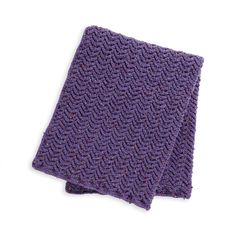 a purple knitted cloth on a white background