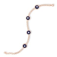 This stunning bracelet features bezel-set diamond links and four evil eye stations set with vibrant lapis and sparkling diamonds. Lobster claw clasp. -14k gold weighing 9.72 grams -160 round diamonds weighing 1.12 carats -4 lapis totaling 3.6 carats Available in rose, yellow, and white gold Please allow 4-6 weeks for delivery if item is not in stock. Item no. BR00876