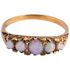 The opals in this ring are gorgeous and throw some great colours. They are set upon the 9ct gold ring in claw settings. Made in Birmingham, England. Ring Size: N 1/2 or 7 Band Width: 6.5mm Height Off Finger: 5mm Weight: 3.3g Birmingham England, Ring Art Deco, Antique Diamond, Stone Cuts, Opal Jewelry, Stone Ring, Stone Rings, Birmingham, Gold Ring