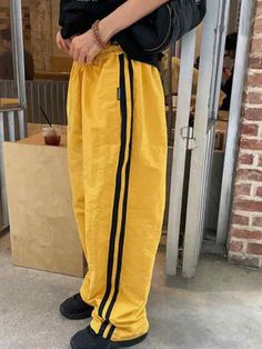 ⚡Buy 2023 Contrast Color Stripe Patchwork Wide Leg Pants Yellow M under $39.00 in Pants at AnotherChill.com Online. Style: Casual/Street/Punk/Vintage/Hip Pop. Fabric Content: Polyester. Fit Type: Loose fit. Eye Catching Color: The vibrant and lively yellow color of these pants is sure to turn heads wherever you go, making them a must have for those who like to stand out from the crowd.. Casual and Sporty: The loose fit design of these pants gives them a casual and sporty feel, making them perfect for everyday wear or for sporting activities.. Versatile Style: With a mix of casual, street, punk, vintage, and hip hop styles, these pants can be paired with a variety of tops and accessories, making them a versatile addition to any wardrobe.. High Quality Fabric: Made from polyester, this pants Stripe Patchwork, Street Punk, 2000s Outfits, Punk Vintage, Punk Inspiration, Pantalon Large, Crop Top Blouse, Cutout Dress, Hip Hop Fashion