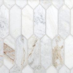 white marble hexagonal tiles with gold veining