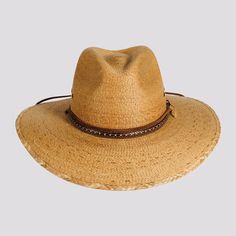 Falcon | Mens Fine Mexican Palm Wide Brim Straw Sun Hat is designed for men who need stylish sun protection. Made from fine Mexican palm and featuring a faux leather band and chin cord, it’s perfect for outdoor adventures or relaxing in the sun. Material: Fine Mexican Palm Shape: Outback Trim: Faux Leather Band and Chin Cord Brim size: 3 1/2" Crown height: 3 3/4" Sweatband: Elastic Sweatband Imported Mexican Palm, Straw Cowgirl Hat, White Cowboy Hat, Hats For Big Heads, Brown Cowboy Hat, Leather Cowboy Hats, Patriotic Hats, Black Cowboy Hat, Outback Hat