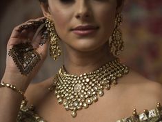 "Mendhika Jadau Polki Set A gold tone chunky Polki Jadau Necklace Set with big Kundan stones. An array of mini polki pieces encircle a jadau kundan pear shape motif with beautiful matching jhumkis/earrings. Can be worn with a statement long necklace for a bridal jpiece. Approximate earrings length is 3.5\". * Check out Manpreet Toor wearing this for a shoot to see the entire look! Tikka and different set of earrings can be added for additional cost. Gold-plated on high-quality brass as base meta Manpreet Toor, Diwali Photoshoot, Jadau Necklace Set, Jadau Necklace, Polki Sets, Test Shoot, Polki Necklace, San Ramon, Engagement Party Wedding