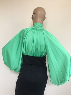 "This is a very stylish Womens Silk blouse. It is comfortable and cozy. Made for a free flowing fit. Great for all year around and for any special occasion or casual day can be dressed up or dressed down. SIZE CHART SIZE S - US 6, UK 8, EU 36 bust: bust around 34.5\"/90cm Waist: waist around 27.5\"/70cm Hips: hips around 34.5\"/90cm SIZE M - US 8, UK 10, EU 38 bust: bust around 37.5\"/95cm Waist: waist around 29.5\"/75cm Hips: hips around 37.5\"/95cm SIZE L - US 10, UK 12, EU 40 bust: bust aroun Spring Evening Blouse With Lantern Sleeves, Silk Puff Sleeve Evening Blouse, Silk Puff Sleeve Blouse For Evening, Silk Evening Blouse With Lantern Sleeves, Party Silk Blouse With Lantern Sleeves, Chic Silk Blouse For Evening, Silk Blouse With Lantern Sleeves For Evening, Silk Party Blouse With Lantern Sleeves, Chic Long Sleeve Cocktail Top