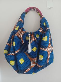 A simple yet classy and noticeable African Print/Ankara handbag! Ankara Handbags Kitenge, Ankara Handbags, Kitenge, African Prints, Waxed Cotton, Hand Bag, African Print, Ankara, Purses And Handbags