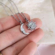 This Sun & Moon necklace set is perfect for sharing with those you love, to celebrate a love but also a deep bond of friendship. Entirely made of stainless steel to guarantee quality and durability, they are minimal, essential, discreet, suitable for wearing every day to celebrate an unbreakable bond. Upon request it is possible to engrave your names on the back of the pendants, contact me to find out more! This is the perfect gift to share with your Valentine, lover, best friend, Galentine, and the ideal couple necklaces to share with your Soulmate! DETAILS: - materials: 14k gold plated stainless steel - pendant size: 18mm SHIPPING All orders will be shipped out through DHL Express or UPS Express. Please double check the address is correct before checking out. 🌍Shipped in totally plastic Celestial Stainless Steel Necklaces As Gift, Celestial Stainless Steel Necklace For Gifting, Celestial Stainless Steel Necklace As Gift, Celestial Stainless Steel Necklace For Gift, Celestial Style Stainless Steel Necklace For Gift, Silver Clavicle Chain Necklace For Friendship, Minimalist Silver Necklaces For Friendship, Minimalist Silver Necklace For Friendship, Silver Stainless Steel Couples Jewelry