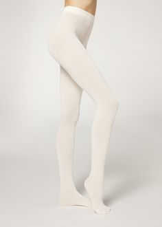 Buy Ribbed Cashmere Blend Tights on our official Calzedonia website. Experience our long history of tradition and quality. Stradivarius Ribbed Leggings, Winter Stocking Leggings, White Wool Leggings, Fitted Ribbed Tights For Loungewear, Fitted Cotton Hosiery, Fitted Cotton Hosiery In Solid Color, Fitted Solid Cotton Hosiery, Fitted Ribbed Tights For Fall, Fitted Ribbed Tights For Winter