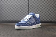 Elevate your streetwear game with these denim sneakers, drawing inspiration from the iconic Louis Vuitton Trainer. The classic low-top silhouette is reimagined with a stylish denim upper, accented by the signature monogram print for a touch of luxury. Crisp white detailing on the laces, midsole, and outsole creates a fresh contrast, while the overall design offers a unique blend of casual comfort and high-fashion appeal. Louis Vuitton Trainer, Louis Vuitton Trainers, Sneakers Drawing, Denim Sneakers, Bottega Veneta Shoulder Bag, Loafer Sneakers, Monogram Prints, Denim Blue, Drawing Inspiration