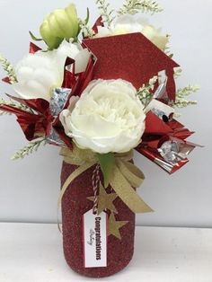 a vase filled with flowers on top of a table