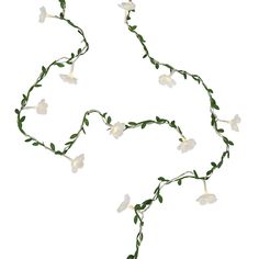 a necklace with white flowers and green leaves hanging from it's sides, on a white background