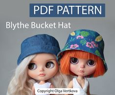 two dolls wearing hats with the caption, blythe bucket hat copyright oga verkova