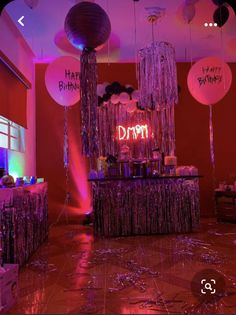 an image of a birthday party setting with balloons and streamers on the dance floor