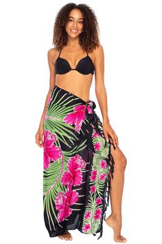 PRICES MAY VARY. COLORFUL HIBISCUS FLORAL BLACK AND PINK SARONG. This vibrant sarong has bold pink flowers accented with bright green leaves on a black background for a beautiful, tropical look. Trimmed with boho fringe, the design is printed on both sides COCONUT SHELL INCLUDED FOR EASY TYING. Generously sized at 67” x 45”, this swimsuit coverup will fit most figures. Sarongs for women are perfect for the beach, poolside, a cruise, backyard party, or dress it up for a summer night out WEAR YOUR Floral Print Beachwear Sarong For Vacation, Beachwear Floral Print Sarong For Vacation, Tropical Sarong For Beach Season, Beachy Floral Print Sarong For Vacation, Vacation Beachwear Sarong With Floral Print, Black Tropical Swimwear With Floral Print, Black Tropical Print Swimwear, Hawaiian Floral Print Bottoms For Vacation, Black Summer Swim Skirt For Beach Season