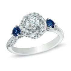 a diamond and blue sapphire engagement ring