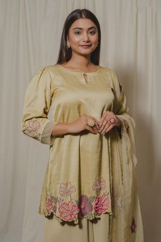 Pale yellow satin linen kurta embroidered with pearls, cutdana, beads, sequins and patchwork with delicate organza detailing on the sleeves. Comes with flowing georgette palazzo and organza dupatta.
Components: 3
Pattern: Embroidered
Type Of Work: Pearls, cutdana, beads, sequins
Neckline: U Neck
Sleeve Type: Puff
Fabric: Kurta: Satin Linen, Palazzo: Double Georgette, Dupatta: Organza
Color: Yellow
Other Details: 
Cutwork hem kurta
Scalloped hem dupatta
Attached lining
Approx.. Product weight: 1- Georgette Palazzo, Yellow Kurta, Kurta Palazzo Set, Fabric Print Design, Georgette Dupatta, Yellow Satin, Palazzo Set, Organza Dupatta, U Neck