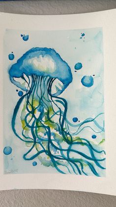 a watercolor painting of a jellyfish