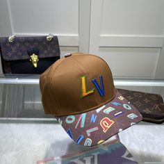 SHOP MORE LUXURY PRODUCTS HERE Description Louis Vuitton Embroidered Logo Baseball Cap Red LV Cap Sports-inspired style meets impeccable craftsmanship in the LV. The design is finished with an adjustable strap for a custom fit. RedLogo LVAdjustable strap at back Includes box, dust bag.This product is of the premium quality. Luxury Snapback Baseball Cap, Designer Baseball Cap With Embroidered Logo, Trendy Snapback Hat With Logo, Designer Embroidered Logo Baseball Cap, Adjustable Flat Brim Baseball Cap With Logo, Luxury Adjustable Snapback Baseball Cap, Designer Adjustable Visor Hat, Luxury Snapback Hat With Embroidered Logo, Luxury Brown Hat With Embroidered Logo