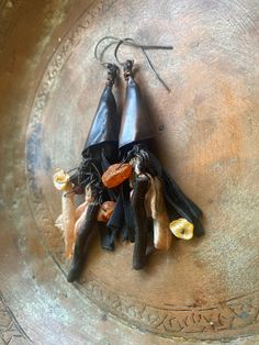 WITCH EARRINGS / Copper Rustic Earrings / Handmade / One of A Kind / Copper Jewelry I designed with genuine black leather and Copper The measured is from top to the end 9cm I have oxidized with liver of sulphure. I will send you nice gift box ,eco-friendly packet and Registered AirMail. Many thanks for visit my store.🧚🧚 Witchy Dangle Earrings For Festival, Handmade Witchy Dangle Earrings, Unique Orange Earrings For Festival, Witchy Black Earrings For Festival, Handmade Vintage Halloween Earrings, Vintage Handmade Halloween Earrings, Black Witchy Earrings For Festival, Bohemian Earrings For Halloween Gift, Bohemian Halloween Earrings As Gift