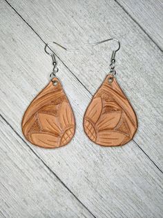 Hey, I found this really awesome Etsy listing at https://www.etsy.com/listing/719911879/teardrop-sunflower-tooled-leather Everyday Leather Teardrop Earrings, Leather Teardrop Earrings For Everyday Use, Brown Dangle Flower Earrings For Pierced Ears, Brown Flower Drop Earrings, Beige Leather Jewelry, Everyday Brown Teardrop Earrings, Handmade Teardrop Faux Leather Earrings, Handmade Brown Faux Leather Earrings, Everyday Brown Teardrop Earrings For Pierced Ears