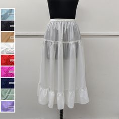 Discover the timeless allure of the cotton ruffle half slip. Crafted from high-quality cotton, it offers comfort and elegance. Perfect for a seamless silhouette, it adds a layer of modesty to skirts and dresses. Embrace classic style with this versatile wardrobe essential. Cotton Underskirt / Cotton Petticoat / Cotton Half Slip / Cotton Dress Liner ➡️Sale for 1 Half Slip ➡️100 % Light Weight Cotton.. ➡️Care: Hand wash in cold water. Do not bleach.  ➡️Available sizes : (Measurements are of garment only) X-SMALL- Fits US Size 0-2 (Elastic waistband 21.5" inch relax to 24.5" inch stretched, Hip 35" inch). SMALL- Fits US Size 2-4 (Elastic waistband 23" inch relax to 27" inch stretched, Hip 38" inch). MEDIUM- Fits US Size 6-8 (Elastic waistband 27" inch relax to 32" inch stretched, Hip 42" inch Elegant Cotton Skirt With Ruffle Hem, Cotton Skirt With Ruffle Hem For Daywear, Cotton Petticoat With Gathered Skirt For Daywear, Cotton Ruffled Tiered Petticoat, Spring Cotton Petticoat With Ruffles, Cotton Petticoat With Ruffled Tiered Skirt, Summer Cotton Petticoat With Ruffles, Daywear Tiered Gathered Petticoat, Summer Tiered Petticoat With Attached Cancan