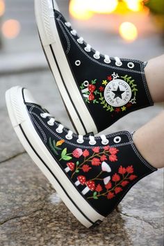 ❤️ Hand-Embroidered Converse Chuck Taylor Shoes - Mushroom and Flower Design Step into a world of whimsy with these custom hand-embroidered Converse Chuck Taylor shoes. Each pair features intricate mushroom and flower designs, meticulously stitched to bring a touch of nature's magic to your everyday style. Crafted with high-quality materials, these shoes offer the perfect blend of comfort and durability. The classic Chuck Taylor silhouette is elevated with vibrant, detailed embroidery, making ea Design Converse, Embroidered Sneakers, Chuck Taylor Shoes, Embroidered Converse, Converse Custom, Custom Converse, Detailed Embroidery, Nature Inspired Design, Perfect Shoes