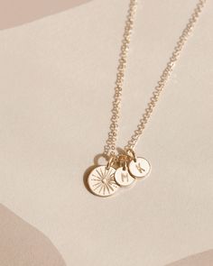 Directions: Add your initials. Wear everyday. Everyday Medallion Jewelry For Mother's Day, Everyday Spiritual Round Charm Necklaces, Round Pendant Charm Necklace For Mom, Everyday Medallion Jewelry With Charms, Charms Round Pendant Necklace For Mom, Spiritual Engraved Round Charm Necklaces, Everyday 14k Gold Medallion Charm Necklace, Anniversary Charm Necklace With Coin Pendant, Anniversary Coin Pendant Charm Necklaces