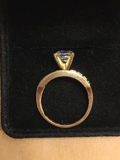 This is a lovely hardly worn cubic zirconia ring. This ring had a center stone that is the size of a 1carat diamond but is a brilliant cubic zirconia. 26 brilliant cubic zirconia flank the sides . This ring can be worn as an engagement ring or a dinner ring . Or wear it when you are on vacation and don't want to worry about your jewelry. Sparkling and beautiful. Inside marked 14kt cz. This is a high quality piece of jewelry. Size 5 Diamond White Rings With Vs Clarity And Round Cut, Promise Ring With Asscher Cut Cubic Zirconia Diamond, 14k Gold Emerald Ring With Brilliant Cut For Promise, Sapphire Cubic Zirconia Promise Ring With Center Stone, 14k Gold Emerald Ring With Vs Clarity, 14k Gold Emerald Ring With Princess And Brilliant Cut, Cubic Zirconia Asscher Cut Promise Ring, Cubic Zirconia Fine Jewelry For Wedding Proposal, Promise Ring With Princess Cut Brilliant Emerald