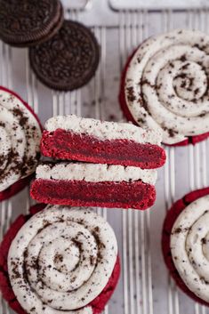 red velvet cupcakes with white frosting and oreo cookies