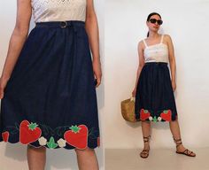 "Vintage '70s strawberry denim skirt cotton denim with strawberry appliques elastic waist with attached buckled belt A line shape DETAILS-----> Era: '70s Fabric: cotton denim MEASUREMENTS-----> Tag: n/a - no size marked . Should suit a modern xs/s - medium Waist: 11.5\" - about 16\" Hips: about 21.5\" (7\" from waist) Length: 25.5\" CONDITION-----> In excellent vintage condition. No flaws to note. MODEL SPECS-----> xs/s / 5'5\" / 34\", 26\", 36\"" 70s Denim Skirt, Blue Retro Denim Skirt, Retro Blue Cotton Denim Skirt, High Waist Vintage Denim Mini Skirt, Retro Denim Mini Skirt, Applique Jeans, Strawberry Patch, Waist Length, Jean Skirt