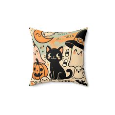 a black cat sitting on top of a pillow with halloween decorations around its neck and head