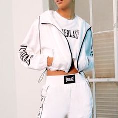 Nwt Forever 21 Everlast Cropped Windbreaker Full Zip Size 0x New With Tags White With Black Lettering Contrast Trim, Long Sleeves, Everlast Text, Elasticized Trim, Zip Front, Hooded, Slant Front Pockets, Cropped Hem, Side Toggle Closures Right And Left Hem 100% Polyester Machine Wash Cold White Oversized Sporty Windbreaker, Sporty White Oversized Windbreaker, Forever 21 Sporty Long Sleeve Outerwear, Forever 21 White Trendy Outerwear, Trendy White Outerwear From Forever 21, White Long Sleeve Outerwear By Forever 21, Sporty Spring Outerwear From Forever 21, Trendy White Long Sleeve Windbreaker, Cropped Windbreaker