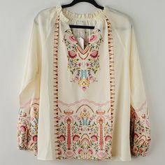 Botanica Blouse Top Longsleeve Embroidered V-Neckline Elastic Cuff Sleeve Color Cream Multicolor Size Large Brand New Without Tag Inventory# D220 Measurements Approx Length 26" Chest 21.5" Fall V-neck Blouse With Embroidered Sleeves, Spring Folk Style V-neck Peasant Top, Bohemian V-neck Blouse With Multicolor Embroidery, Bohemian V-neck Blouse With Embroidered Hem, Floral Embroidered V-neck Blouse For Vacation, Feminine Embroidered V-neck Blouse, Spring V-neck Peasant Top, Fall Floral Print Blouse With Multicolor Embroidery, Spring V-neck Blouse With Embroidered Sleeves