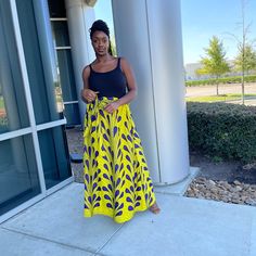 African Ankara Print Long Skirt Elastic Waist A Line Skirt With Elastic Made With Poly Cotton Fabric Yellow, Purple With Black Model Wears Size 12 Yellow Summer Maxi Skirt With Elastic Waistband, Yellow Maxi Skirt For Spring, Fitted Yellow Maxi Skirt, Yellow Wide Leg Maxi Skirt For Spring, Casual Yellow Maxi Skirt For Summer, Yellow Flowy Maxi Skirt For Summer, Casual Yellow Maxi Skirt For Vacation, Summer Yellow Flowy Maxi Skirt, Yellow Fitted Maxi Skirt For Day Out