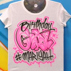 Airbrush Graffiti Birthday Name Design T shirt Custom Name White T-shirt For Birthday, Custom Name T-shirt For Birthday With Crew Neck, Custom Name Crew Neck T-shirt For Birthday, Custom Name White Crew Neck T-shirt, Customizable Pink Graphic Tee, Customizable Trendy T-shirt For Streetwear, White Short Sleeve T-shirt With Custom Name, White Crew Neck T-shirt With Custom Name, Pink Custom Print T-shirt For Streetwear