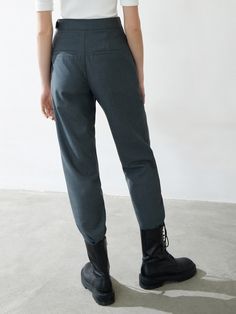 MO&Co. Women's Wool Blend Irregular Wrap Pants Features : - High waist- Small tapered pants- Double side pocket designCode: MBB1PAT032The length of size M is 95cmWhite: Model is 175cm tall and wearing a size M MATERIALS & CARE : Material: 56.1% Polyester 43.9% WoolDo not wash, do not bleach Hang to dry, do not tumble dry Iron at low temperatures, professional dry cleaning Do not expose to the sunTips: Wrap metal parts before dry cleaningPlease select your own size in the size chart according to Baggy Winter Bottoms For Workwear, Baggy Bottoms For Workwear In Winter, Winter Harem Pants With Pockets And Tapered Leg, Winter Tapered Leg Harem Pants With Pockets, Winter Tapered Leg Bottoms With Pockets, Winter Workwear Baggy Pants, Winter Tapered Leg Bottoms With Cargo Pockets, High Waist Harem Pants For Fall Workwear, Baggy Trousers With Welt Pockets