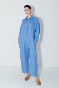 Wide waist Separate band to fit on waist or hips Shirt Collar Centre front hidden button closures Inseam pockets Full-length sleeves with pleats and button cuffs Binded mini-overlock seams Colour: Empyrean Blue One size fits all (S/M/L) 100% Premium LinenMADE IN NEW YORK CITY Casual Linen Long Sleeve Jumpsuits And Rompers, Elegant Jumpsuits And Rompers With Pockets And Relaxed Fit, Collared Jumpsuits And Rompers With Pockets In Relaxed Fit, Spring Workwear Jumpsuits And Rompers With Button Cuffs, Spring Workwear Jumpsuits With Button Cuffs, Relaxed Fit Jumpsuits And Rompers With Pockets For Daywear, Relaxed Fit Collared Jumpsuits And Rompers For Work, Relaxed Fit Long Sleeve Jumpsuits And Rompers, Blue Relaxed Fit Jumpsuit With Button Closure