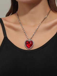 Add a touch of sparkle to your outfit with our Rhinestone Heart Charm Necklace. The silver chain is covered in dazzling rhinestones, with a heart-shaped rhinestone in red, blue, or green. Plus, more rhinestones surround the heart, making this necklace a true statement piece. (Can you handle the bling?) Heart Cut Cubic Zirconia Party Necklace, Valentine's Day Party Heart Necklace In Cubic Zirconia, Valentine's Day Heart Pendant Necklace For Party, Silver Heart Pendant Rhinestone Necklace For Party, Crystal Heart Pendant Necklace For Party, Heart-shaped Rhinestone Necklace For Valentine's Day Party, Valentine's Day Heart-shaped Rhinestone Necklace For Party, Valentine's Day Heart Rhinestone Necklace For Party, Valentine's Day Party Crystal Heart Necklace