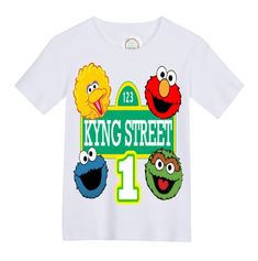 a white t - shirt with sesame characters on the front and number one on the back