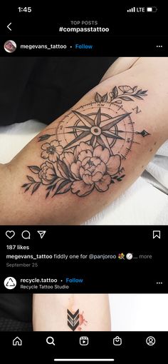 a tattoo on someone's arm with flowers and an arrow in the middle is shown