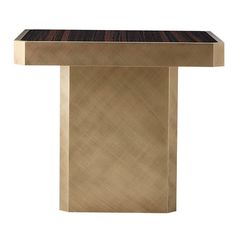 a gold and black table on a white background with no one in it's place