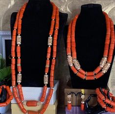 Nigerian wedding jewelry for special occasions. This is original Edo coral(Nigerian Coral) made into 2 steps ganished with non tarnish gold accents. The bride set includes 2 elastic bracelet and a set of earrings. The male set is also 2steps with a bracelet Feel free to start a conversation with me. Thank you. Elegant Handmade Necklaces For Traditional Ceremonies, Elegant Orange Red Coral Beads, Traditional Orange Jewelry For Ceremonies, Elegant Handmade Necklaces For Marriage, Red Large Beads Jewelry For Traditional Ceremonies, Traditional Red Coral Beaded Necklaces For Wedding, Gold Necklaces With Polished Beads For Traditional Ceremonies, Handmade Red Coral Beads For Wedding, Elegant Orange Ceremonial Jewelry