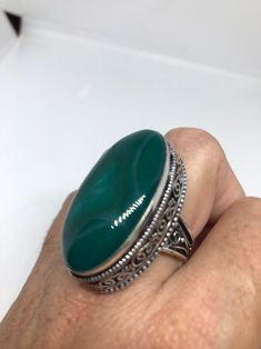 Large green agate Ornate German Silver Vintage ring, does not tarnish Size 9 can be re sized, my jeweler charges a $10 - $15 fee All rings are shipped in a nice gift box. Check out our over a THOUSAND great reviews Engraving is $4 per letter and is not always perfect depending on the piece. It can take a few days if the jeweler is busy. This is payable to Paypal Judithsltd@gmail.com Green Onyx Oval Ring, Green Crystal Ring With Large Stone For Gift, Oval Green Onyx Gemstone Ring, Oval Green Onyx Rings, Spiritual Green Open Ring, Green Turquoise Ring For Jewelry Making, Green Ring With Large Stone, Handmade Oval Green Ring, Green Onyx Rings For Gifts