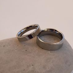 These couple rings have a simple and sleek design. They are made of stainless steel, ensuring they will maintain their impeccable appearance for a long time. The men's ring is 6mm thick, while the women's ring is 4mm. This is a perfect gift option for a loved one. Material: Stainless Steel. Finish: Rhodium plated. Men's Ring Width: 6mm. Women's Ring Width: 4mm. 🔸more from us🔸 https://www.etsy.com/shop/DoraJewelryAccessory Simple Silver Rings For Men, Couple Rings Simple, Couple Rings Silver, Industrial Ring, Silver Rings Simple, Minimalist Ring, Unisex Ring, Ring Promise, Men's Ring