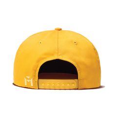 The Gild is a classic six-panel, baseball-style cap in mustard with raised embroidery detail in light yellow. All March Caps feature top eyelets and an adjustable snap-back closure. Each cap comes with a hand-numbered card signed by the designer. Yellow Cotton Trucker Hat, Adjustable Yellow Hat, Yellow Cotton Snapback Baseball Cap, Adjustable Yellow Fitted Hat With Curved Brim, Yellow Baseball Cap With Curved Brim, Yellow Flat Bill Hat, One Size Fits Most, Gold Snapback Hat With Flat Brim For Streetwear, Yellow Adjustable Flat Bill Snapback Hat, Yellow Adjustable Fitted Cap