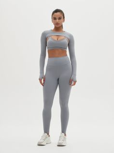 Elevate your activewear wardrobe with the Odette Long-Sleeve Super Crop Top & Sports Bra Set. This unique set combines a stylish super crop top with a supportive sports bra, offering both functionality and fashion. The long sleeves and super crop design provide a chic look, while the sports bra ensures maximum support during your workouts. Perfect for yoga, gym sessions, or casual wear, this set is designed for comfort and performance. Embrace a blend of style and support with the Odette Long-Sl Super Crop Top, Crop Design, Supportive Sports Bra, Sports Bra Set, Supportive Sports Bras, Yoga Gym, Chic Look, Bra Set, High Waisted Leggings