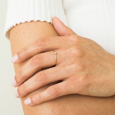 Make your jewelry part of your workout with our Tiny Opal Ring. It's strong enough to stand up to all the sweat while looking beautiful and feminine! Opal is also October's birthstone, so this makes the perfect gift for the October baby in your life! We love it stacked with our Braided Stacking Ring or Simple Stacking Ring. DETAILS 14k gold filled ring 1mm band with 2mm synthetic opal Available in sizes 5-8 Safe for sensitive skin & shower safe Matching jewelry: Tiny Opal Necklace, Tiny Opal Stu Adjustable Solitaire Rings For Everyday, Adjustable Everyday Birthstone Ring, Dainty Diamond Birthstone Ring As Gift, Dainty Diamond Ring As Gift With Birthstone, Dainty Diamond Ring With Birthstone For Gift, Adjustable Birthstone Midi Rings For Everyday Wear, Dainty Promise Birthstone Ring, Minimalist Adjustable Crystal Ring For Promise, Everyday Adjustable Birthstone Midi Rings