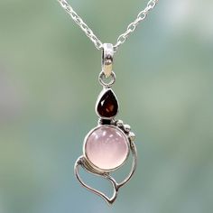 India's Shanker presents an elegant pendant necklace that glows with the beauty of nature. A round stone of chalcedony with a misty pink glow is set beneath a teardrop-shaped faceted red garnet weighing one carat. The stones are framed by local artisans with handcrafted sterling silver openwork. Chalcedony Necklace, Floral Pendant Necklace, Amethyst Necklace Pendant, Elegant Pendant, Fancy Jewelry, Moonstone Pendant, Sterling Silver Necklace Pendants, Amethyst Pendant, Silver Pendants