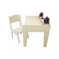 a child's wooden table and chair with colored pencils